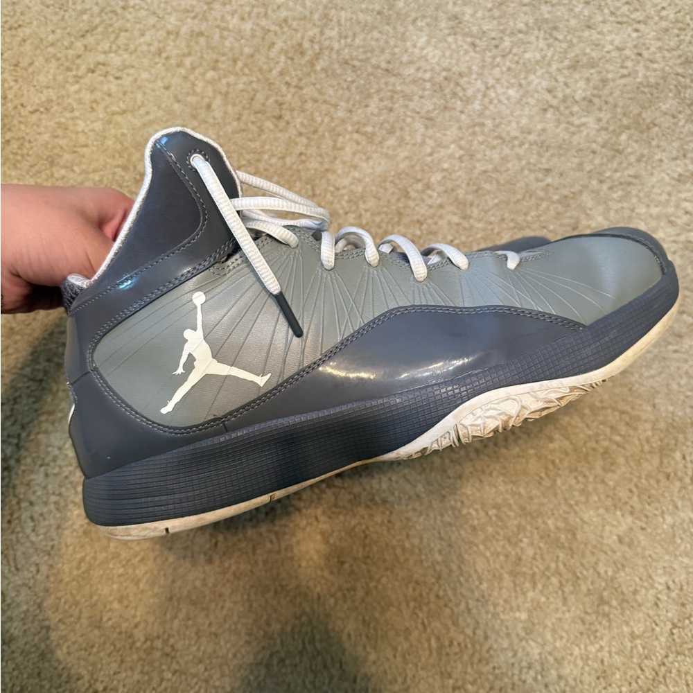 Jordan Gray and White Athletic Shoes with Sleek Design